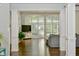 Open living room with hardwood floors, fireplace and large windows at 2838 Silverwood Ln, Greenwood, IN 46143