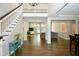 Grand two-story entry with hardwood floors and elegant staircase at 2838 Silverwood Ln, Greenwood, IN 46143