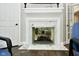 Modern fireplace with marble surround and glass front at 2838 Silverwood Ln, Greenwood, IN 46143
