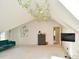 Spacious bonus room with vaulted ceiling, plush carpet, and a TV at 2838 Silverwood Ln, Greenwood, IN 46143