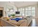 Sunlit living room featuring hardwood floors and cozy sectional sofa at 2838 Silverwood Ln, Greenwood, IN 46143