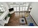 High-ceiling living room with hardwood floors, fireplace and ample natural light at 2838 Silverwood Ln, Greenwood, IN 46143