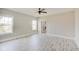 Main bedroom with hardwood floors, ceiling fan, and walk-in closet at 2841 Grandview Ln, Greenwood, IN 46143