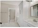 Modern bathroom with double vanity, large mirror, and shower at 2841 Grandview Ln, Greenwood, IN 46143