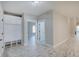Bright entryway with built-in bench, storage, and hardwood floors at 2841 Grandview Ln, Greenwood, IN 46143