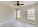 Bright bedroom with hardwood floors and ceiling fan at 2841 Grandview Ln, Greenwood, IN 46143