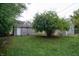 Backyard with detached garage and mature trees at 2363 N Gale St, Indianapolis, IN 46218