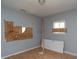 Unfinished bedroom with new window and flooring at 2363 N Gale St, Indianapolis, IN 46218