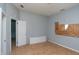 Unfinished bedroom with new flooring and doorway at 2363 N Gale St, Indianapolis, IN 46218