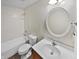 Clean bathroom, featuring a tub, toilet and vanity at 2647 Sheffield Dr, Indianapolis, IN 46229