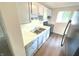 Kitchen with light gray cabinets and a breakfast bar at 2647 Sheffield Dr, Indianapolis, IN 46229
