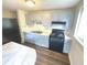 Kitchen with light blue cabinets and flooring at 2647 Sheffield Dr, Indianapolis, IN 46229