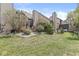 Landscaped backyard with spacious lawn area at 9644 Highgate N Cir, Indianapolis, IN 46250