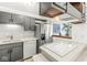 Efficient kitchen with gray cabinetry, stainless steel appliances, and tile flooring at 9644 Highgate N Cir, Indianapolis, IN 46250