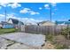 Gravel driveway with gate and wooden fence at 2729 Massachusetts Ave, Indianapolis, IN 46218