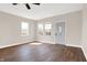 Spacious living room with hardwood floors and neutral walls at 2729 Massachusetts Ave, Indianapolis, IN 46218