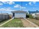 House backyard with small shed, fenced in, and a grassy area at 2729 Massachusetts Ave, Indianapolis, IN 46218