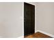 Front entry with dark door and neutral walls at 2729 Massachusetts Ave, Indianapolis, IN 46218