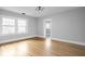 Bright bedroom with hardwood floors and access to bathroom at 3860 N Delaware St, Indianapolis, IN 46205