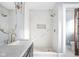 Contemporary bathroom with marble shower and vanity at 3860 N Delaware St, Indianapolis, IN 46205