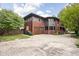 Brick house with a two-car garage and landscaping at 3860 N Delaware St, Indianapolis, IN 46205