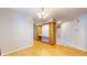 Bright dining room with hardwood floors and built-in cabinetry at 709 Silver Fox Ct, Indianapolis, IN 46217