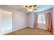 Spacious bedroom with neutral walls and ceiling fan at 709 Silver Fox Ct, Indianapolis, IN 46217