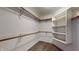 Walk-in closet with ample shelving and hanging space at 709 Silver Fox Ct, Indianapolis, IN 46217