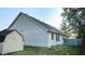 Rear view of house with shed and wooden fence at 709 Silver Fox Ct, Indianapolis, IN 46217