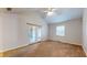 Spacious living room with vaulted ceiling and carpet at 709 Silver Fox Ct, Indianapolis, IN 46217