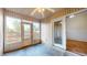 Bright sunroom with ceiling fan and access to backyard at 709 Silver Fox Ct, Indianapolis, IN 46217