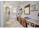 Elegant bathroom with double vanities, a large soaking tub, and plenty of counter space at 5745 Paradise Dr, Martinsville, IN 46151