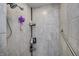 Clean bathroom with shower stall, tiled walls, and convenient shower caddy at 5745 Paradise Dr, Martinsville, IN 46151