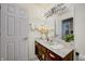 Bathroom with vanity, granite countertop, and decorative accents at 5745 Paradise Dr, Martinsville, IN 46151