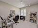 Home office with desk, keyboard, and bookcases at 5745 Paradise Dr, Martinsville, IN 46151