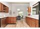 Spacious kitchen with light wood cabinets, stainless steel appliances, and an island at 8850 Crystal Lake Dr, Indianapolis, IN 46240