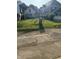 Backyard with grassy area, chain link fence, and neighboring houses at 1804 N Delaware St, Indianapolis, IN 46202