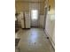 Dated kitchen needing updates, features white tile and appliances at 1804 N Delaware St, Indianapolis, IN 46202