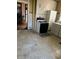 Dated kitchen needing updates, features white tile and appliances at 1804 N Delaware St, Indianapolis, IN 46202