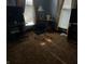 Living room with brown carpet, two windows, and a small chair at 1804 N Delaware St, Indianapolis, IN 46202