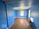Blue walls and hardwood floors at 1452 E Sr 234, Greenfield, IN 46140