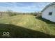 Large grassy backyard with chain link fence at 1452 E Sr 234, Greenfield, IN 46140