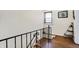 Elegant stairway with black metal railing at 340 Blue Ridge Rd, Indianapolis, IN 46208