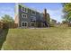 Large backyard with deck and two-story home at 9259 Oak Knoll Ln, Fishers, IN 46037