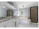 Main bathroom with a soaking tub, double vanity, and walk-in shower at 9259 Oak Knoll Ln, Fishers, IN 46037