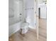 Updated bathroom with a tub and shower combination at 9259 Oak Knoll Ln, Fishers, IN 46037