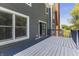 Spacious deck with gray wood and railings at 9259 Oak Knoll Ln, Fishers, IN 46037