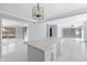 Modern kitchen island with white cabinets and quartz countertops at 9259 Oak Knoll Ln, Fishers, IN 46037