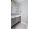 Bathroom with gray vanity and marble flooring at 9259 Oak Knoll Ln, Fishers, IN 46037
