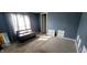 Small bedroom with gray walls, carpet, and a window at 9265 N Evans Rd, Monrovia, IN 46157
